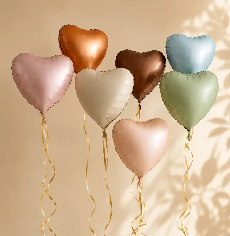 Premium emerald green heart shape biodegradable foil balloons custom manufactured by FAIR factory for corporate events